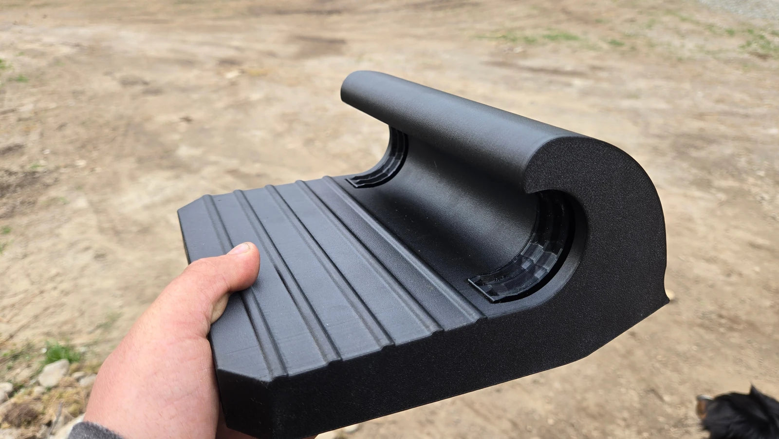 Handheld Toyota step showing tread and curved slider attachment