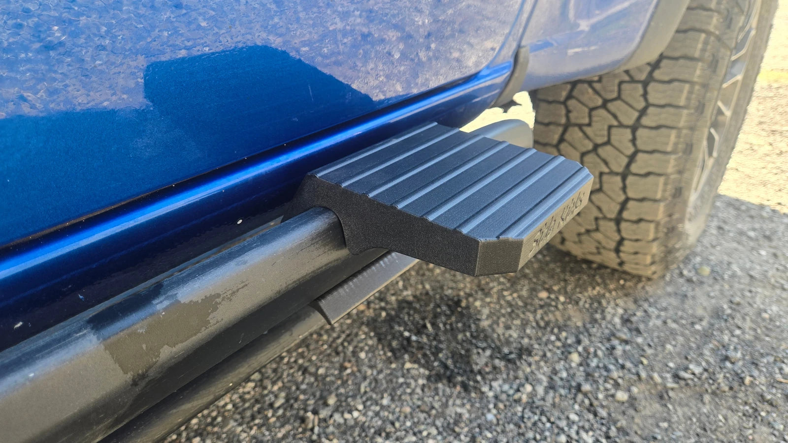 Close-up of a high-position ResilientZ platform mounted on a blue truck